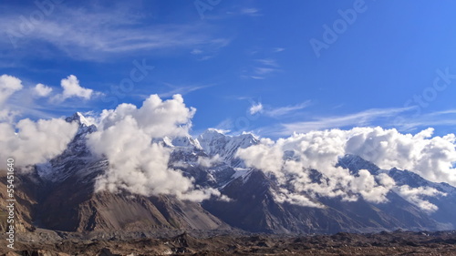 Clouds over glacier Inylchek. Kirgystan, central Tien Shan photo