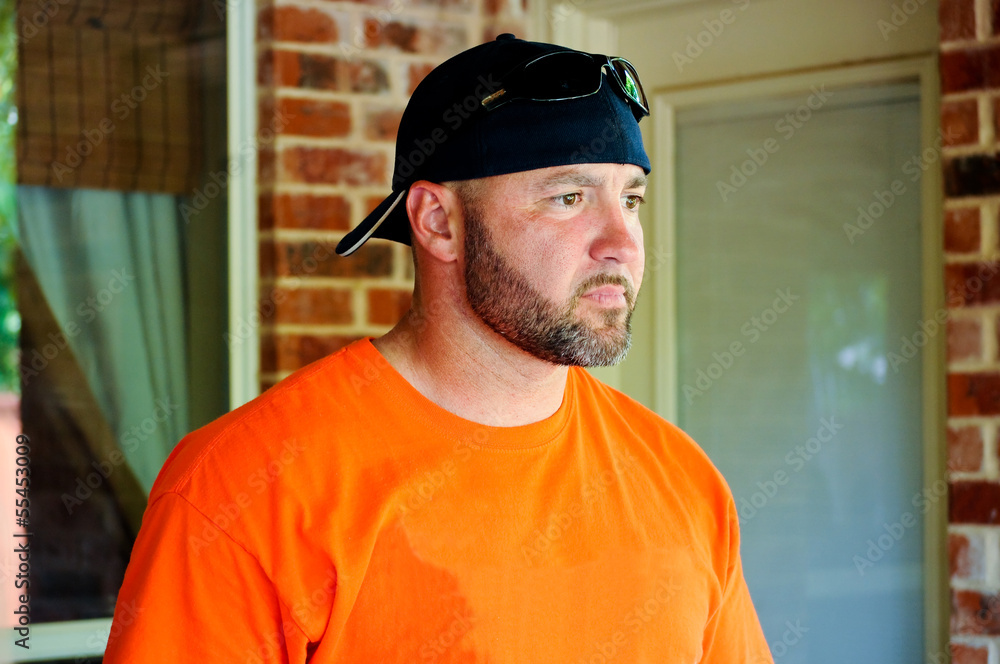 Man with beard and backwards hat Man with beard and backwards hat
