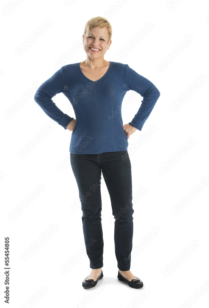Happy Woman In Casuals Standing With Hands On Hips Happy Woman In Casuals Standing With Hands On Hips