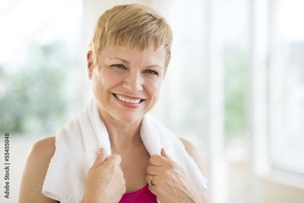 Cheerful Woman With Towel Around Neck