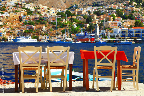 Fototapeta Naklejka Na Ścianę i Meble -  traditional Greece - tavernas near sea. Symi island, Dodecanese