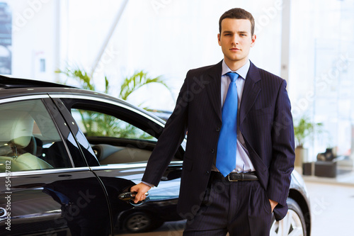 Wallpaper Mural Businessman near car Torontodigital.ca