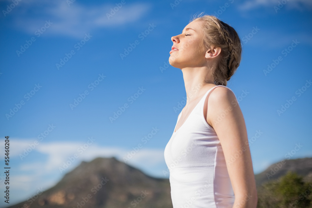 Blonde woman enjoying the sun