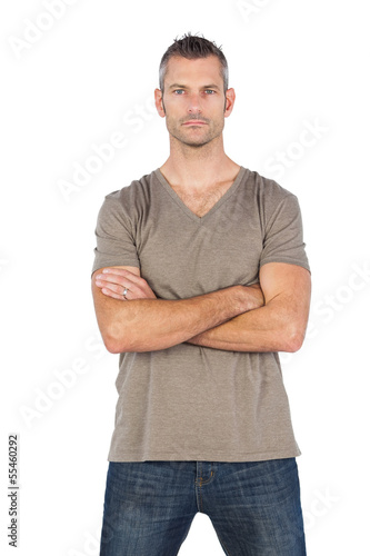 Serious man with arms crossed