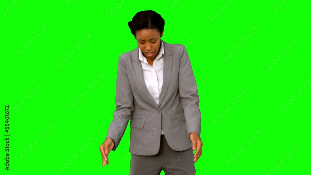 Fired businesswoman dropping a box on green screen Fired businesswoman dropping a box on green screen