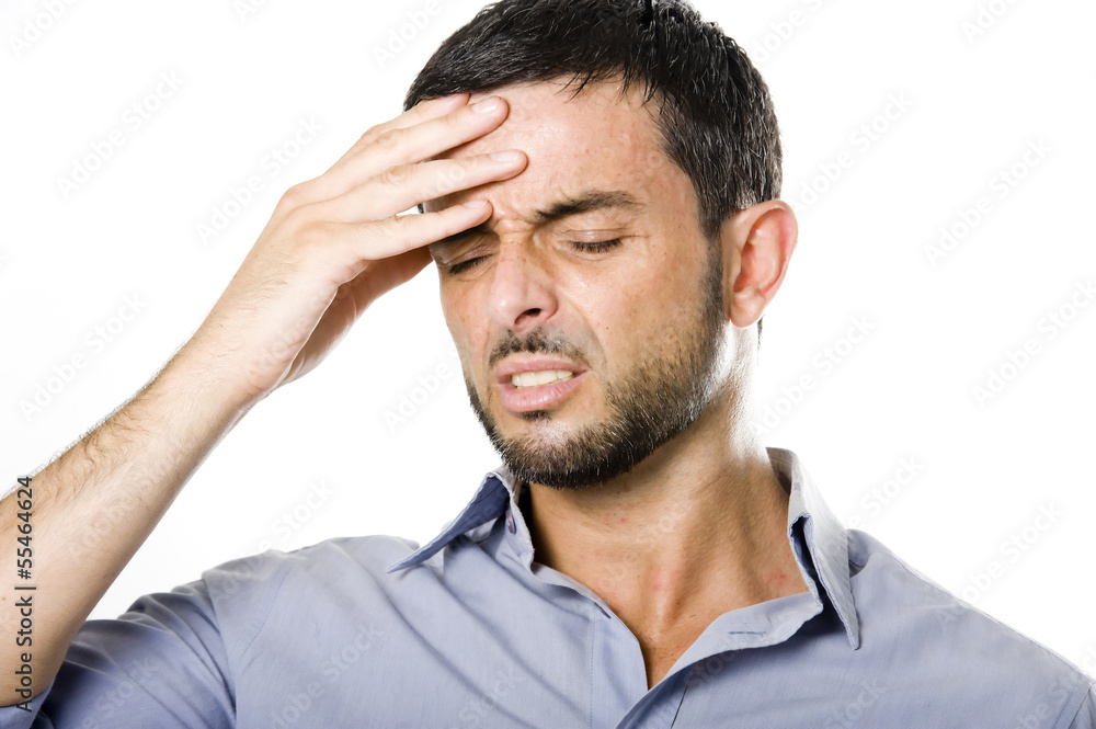 Young Man with Beard suffering Headache Young Man with Beard suffering Headache