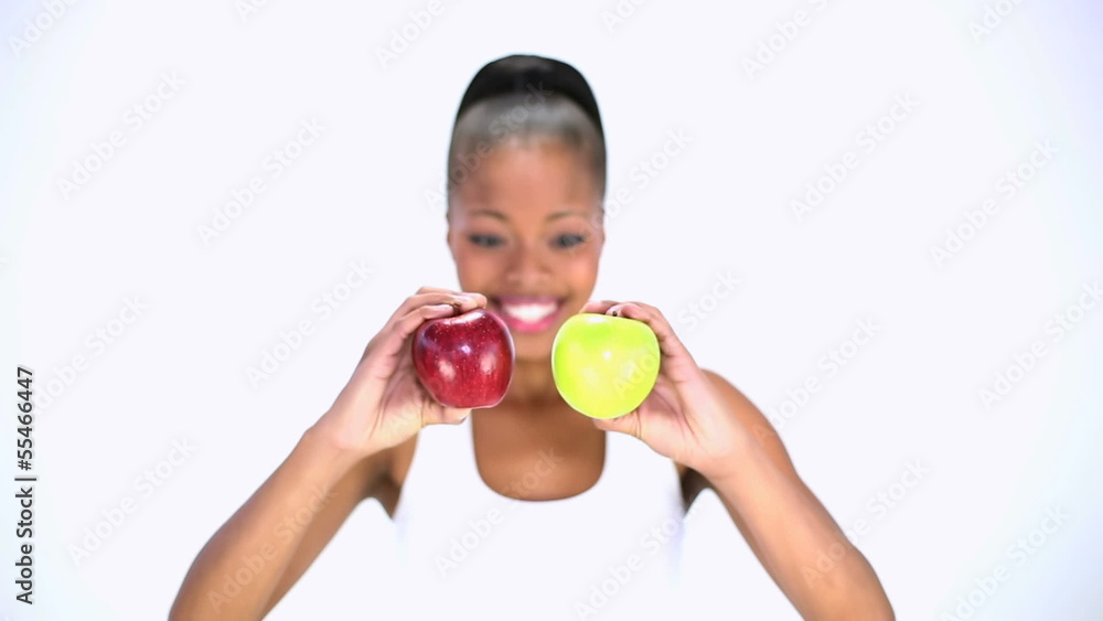 Smiling model holding apples Smiling model holding apples