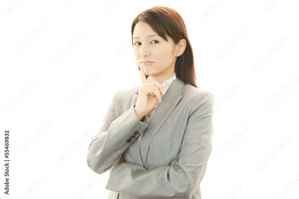 困惑した表情のOL 困惑した表情のOL