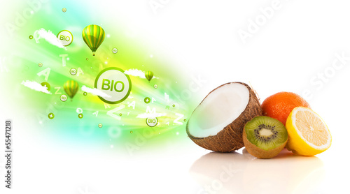 Colorful juicy fruits with green eco signs and icons