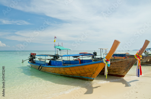 Beautiful image Longtail boat on the sea tropical beach. Andaman