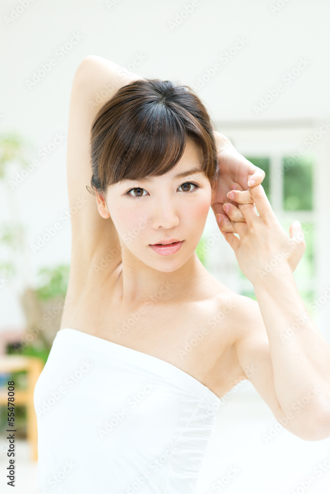 Beautiful young woman relaxing in the room Beautiful young woman relaxing in the room