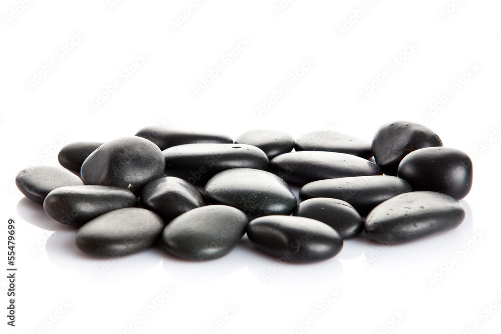 Black massage stones isolated. Black massage stones isolated.