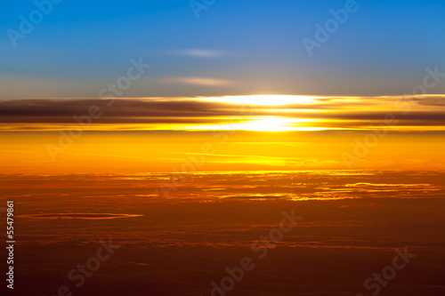 sunset with a height of 10 000 km. Dramatic sunset. View of suns © EwaStudio