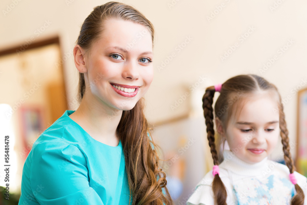teacher and student in the classroom