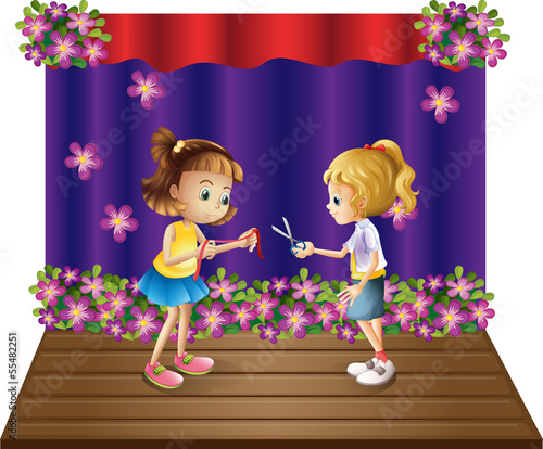 Two kids at the center of the stage