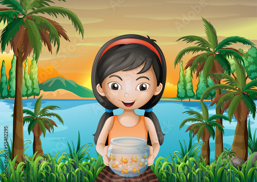 A girl holding an aquarium