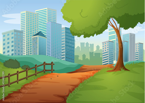 A pathway going to the tall buildings