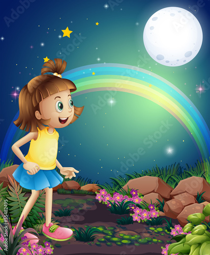 A kid amazed by the sight of the rainbow and the fullmoon
