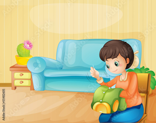 A mother repairing a dress