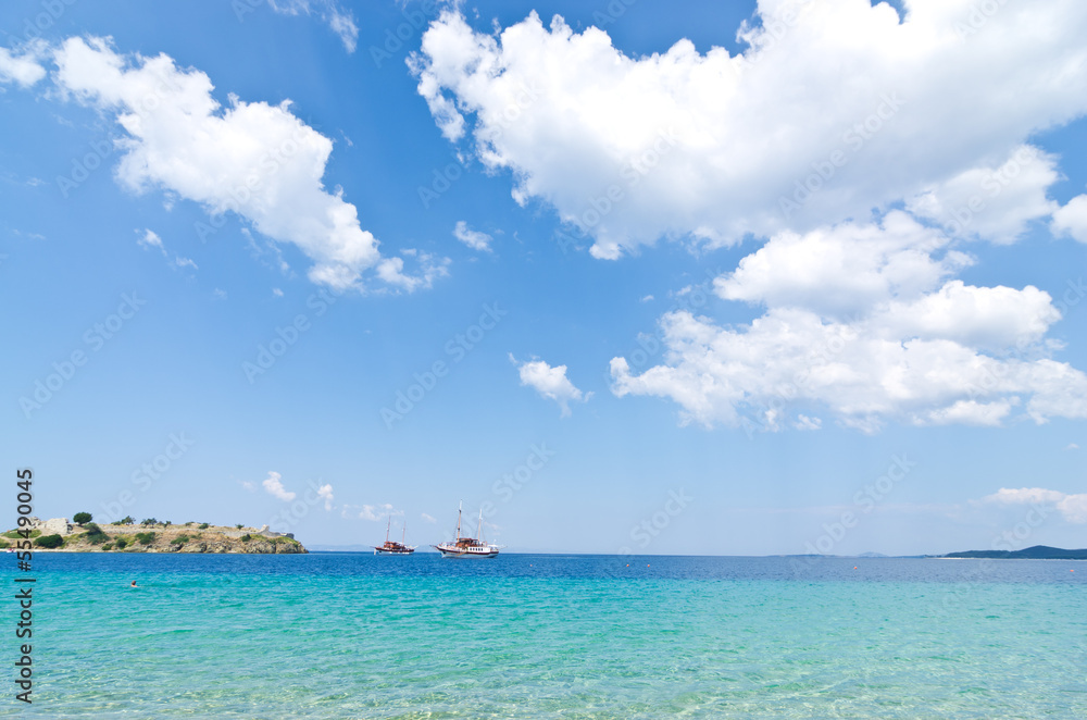 Two ships ahchored by the old roman fortress at Aegean Sea Two ships ahchored by the old roman fortress at Aegean Sea