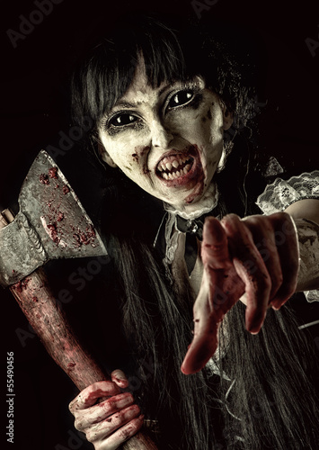 Female zombie with bloody axe