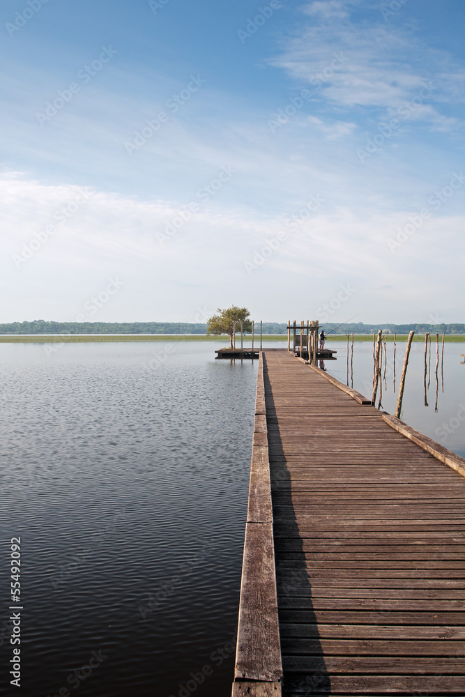 Naklejka premium wooden pier on Soustons lake, France