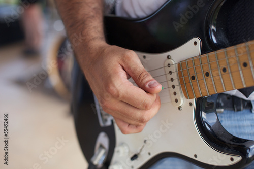 guitar player © Stocked House Studio