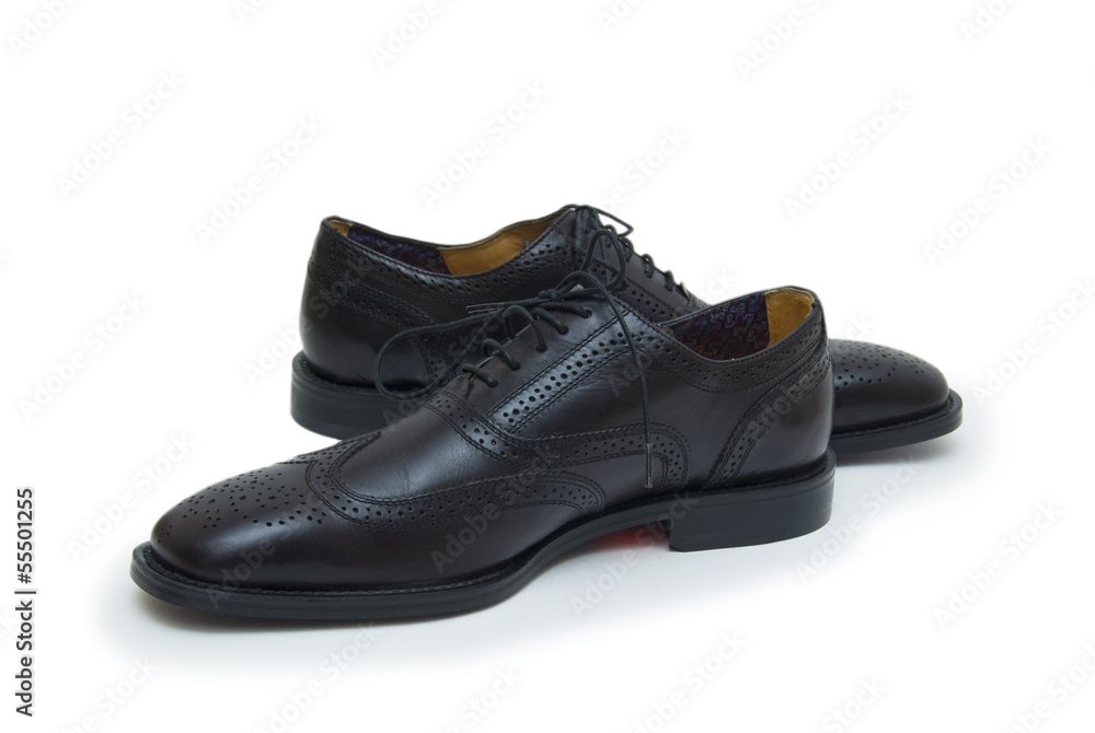 The black man's shoes isolated on white background. The black man's shoes isolated on white background.