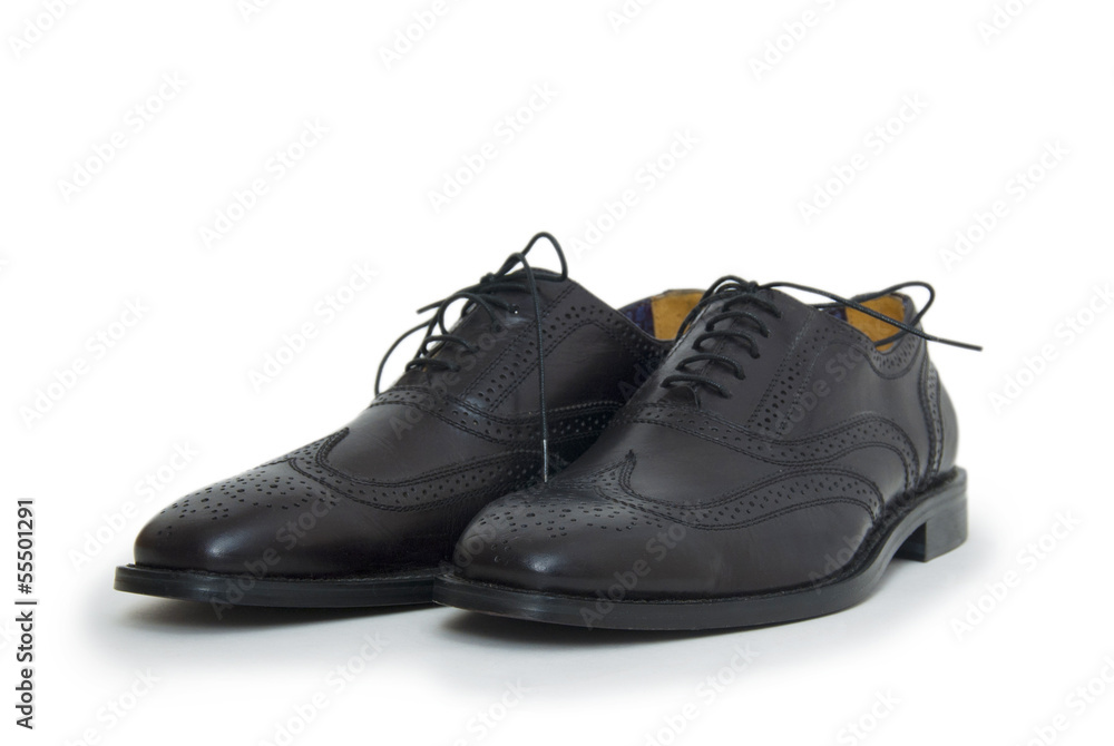 The black man's shoes isolated on white background. The black man's shoes isolated on white background.