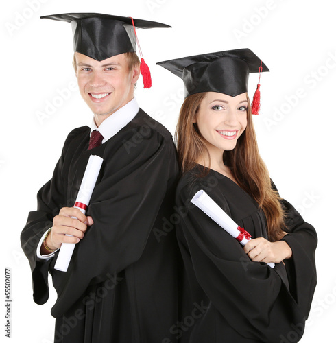 Two happy graduating students isolated on white #55502077