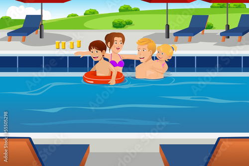 Family having fun in a swimming pool