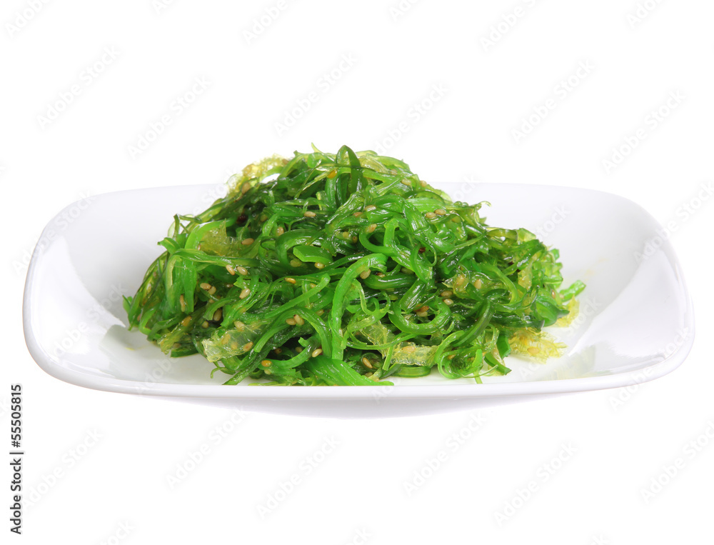 Seaweed with sesame seeds in plate isolated Seaweed with sesame seeds in plate isolated