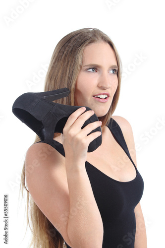 Blonde woman talking with a shoe phone