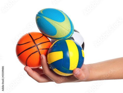 Boy hand with small balls