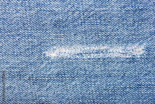 texture of blue jeans torn fabric