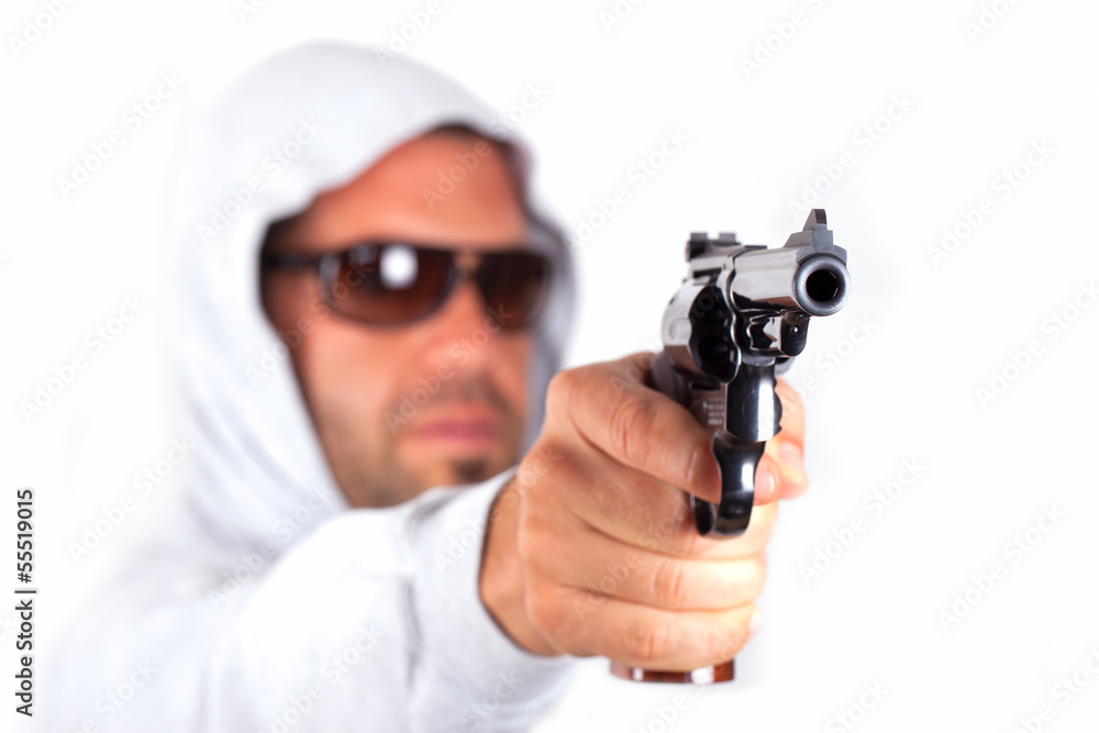 A man pointing his gun revolver. A man pointing his gun revolver.