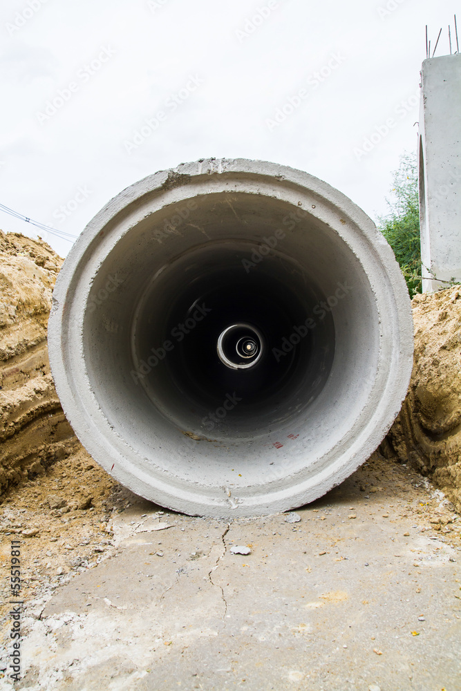 Concrete drainage tube on construction site Concrete drainage tube on construction site