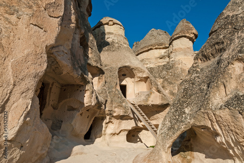 Fairy chimneys hollowed out for dwellings in Cappadocia, Turkey