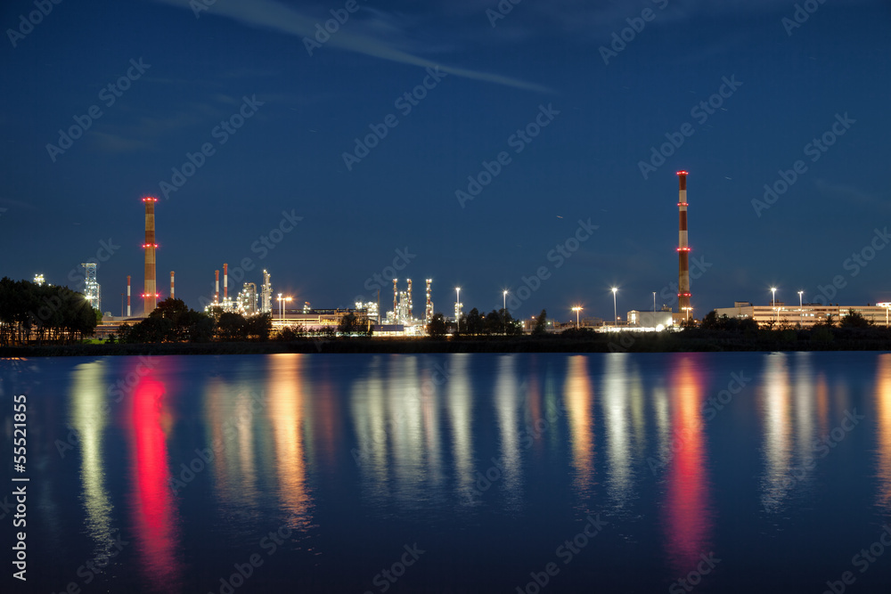 View of large refinery at night in Gdansk, Poland.