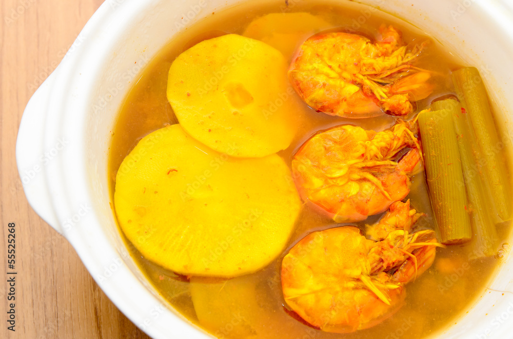 Sour and spicy shrimps curry with bamboo shoot and lotus stem Sour and spicy shrimps curry with bamboo shoot and lotus stem