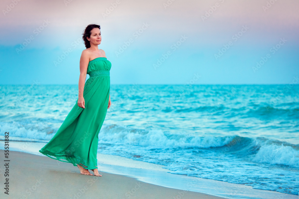 Young beautiful woman enjoying beach vacation Young beautiful woman enjoying beach vacation