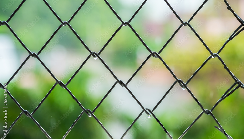 Steel cage with blur background Steel cage with blur background