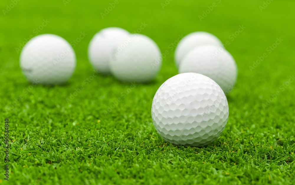 golf ball on green course golf ball on green course