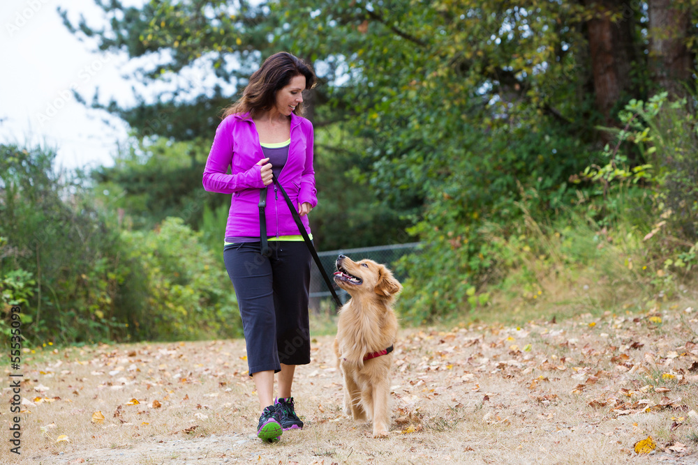 woman walking with dog