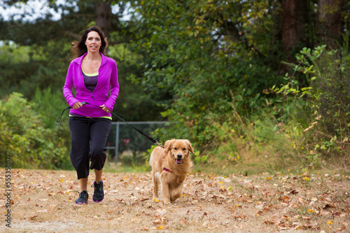 woman walking a dog