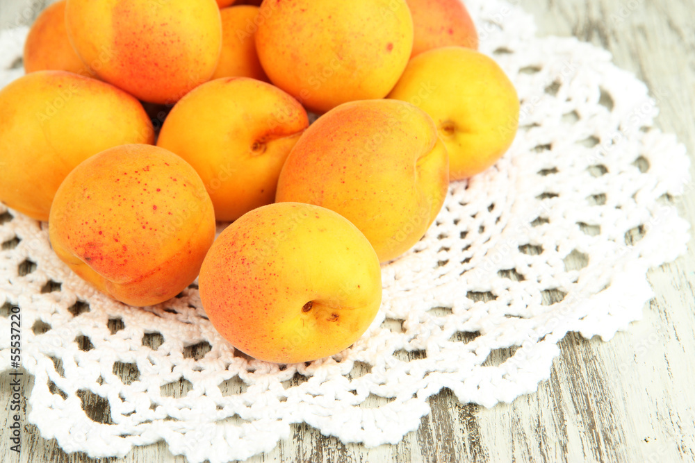 Fresh natural apricot on wooden table close up Fresh natural apricot on wooden table close up