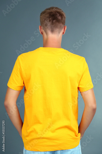 T-shirt on young man, on gr...