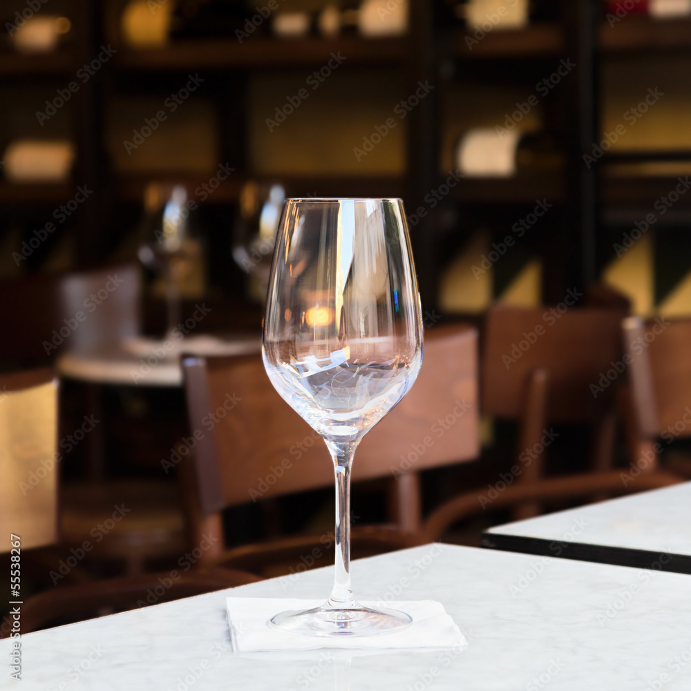 Empty wine glass at the bar, cafe or restaurant Empty wine glass at the bar, cafe or restaurant