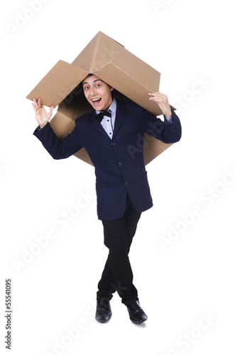 Businessman with box isolated on the white © Elnur