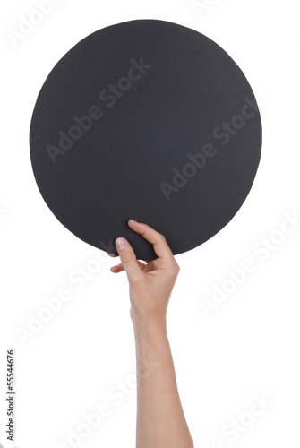 Hand Holding a Black Circle